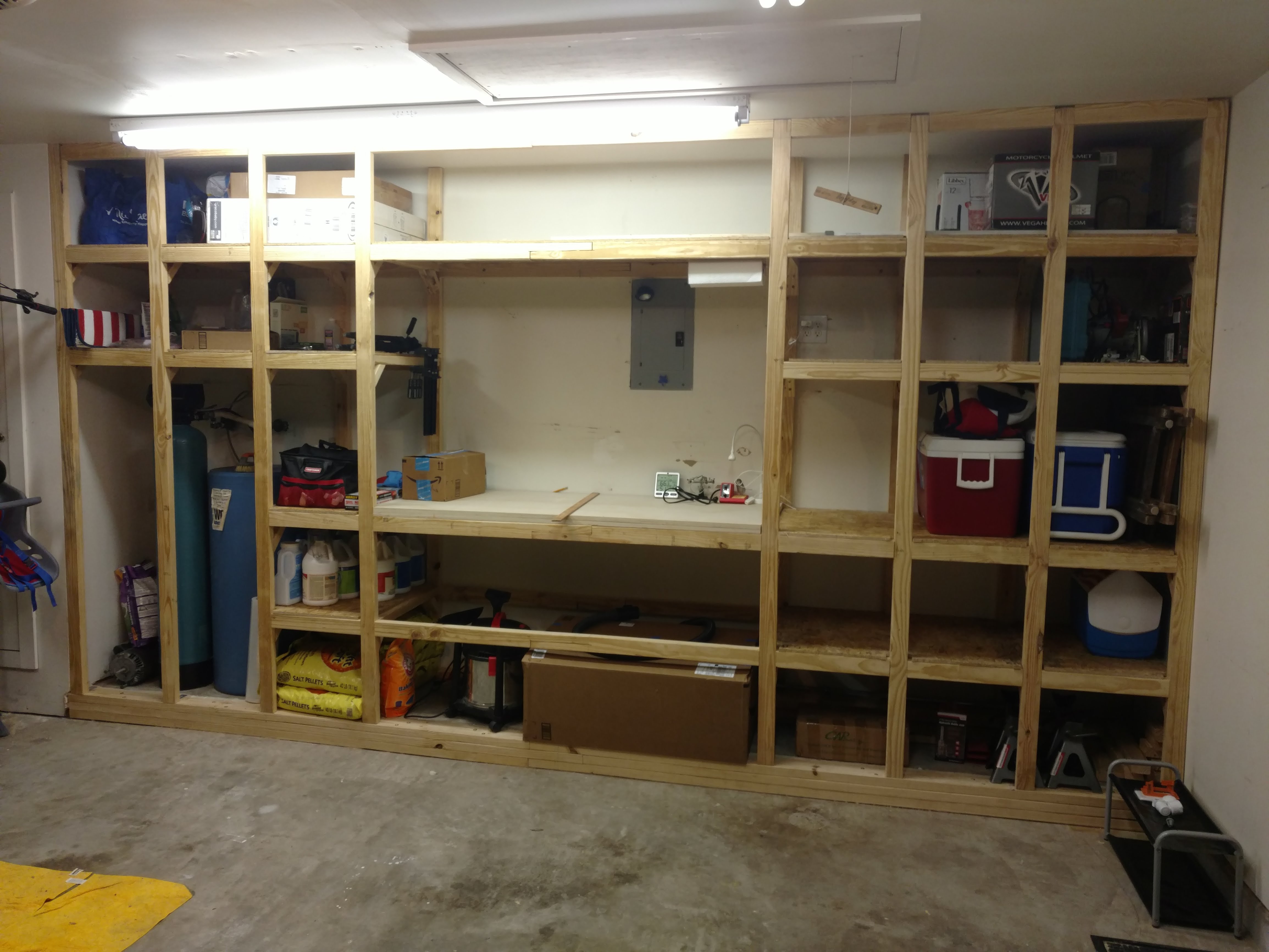 Custom garage storage wall framing and shelving